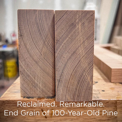 End grain close-up of reclaimed heart pine used in our farmhouse menorah, showing dense growth rings and unique historic character.