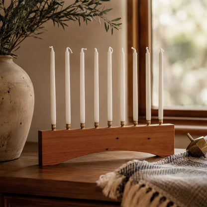 Modern farmhouse Hanukkah menorah handmade from reclaimed heart pine with an arched base and nine brass candle holders