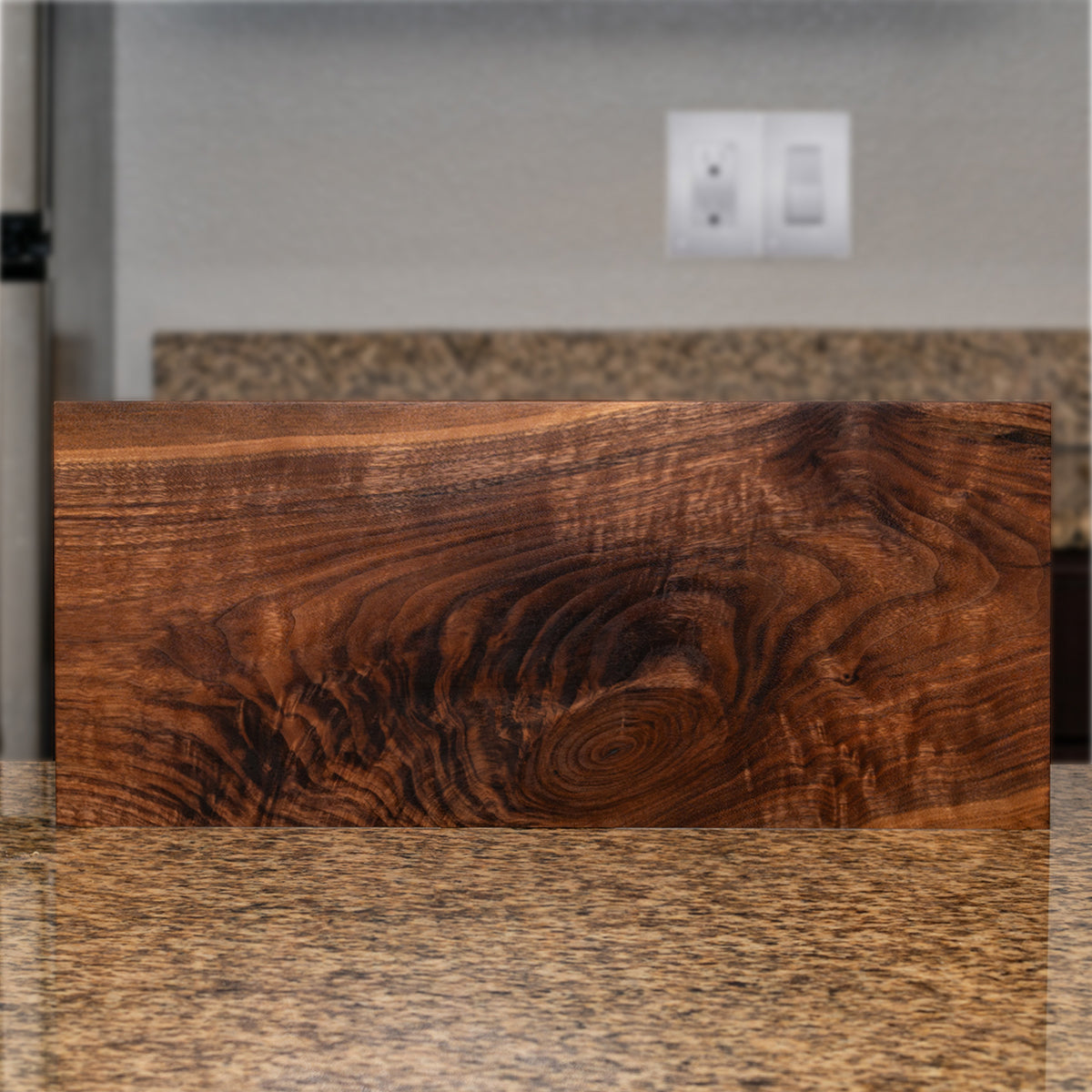 Close-up of figured walnut grain on the Child of Nature magnetic knife block
