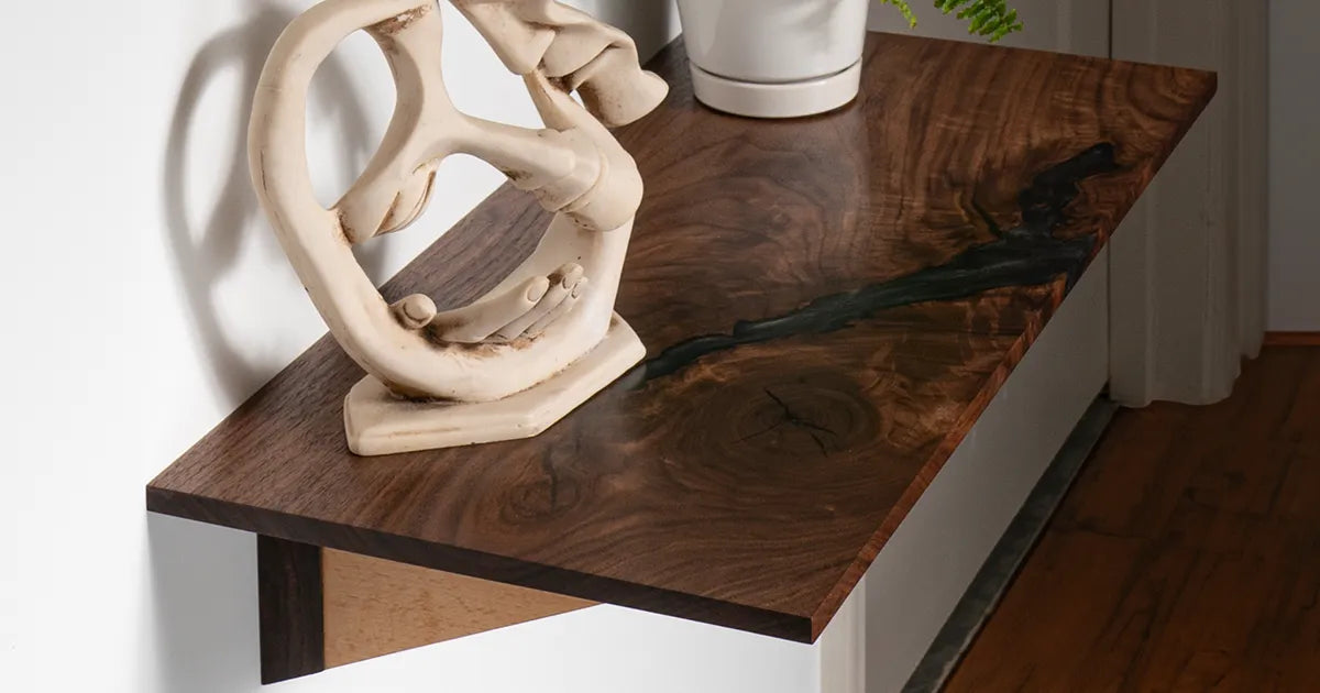 a walnut floating console table