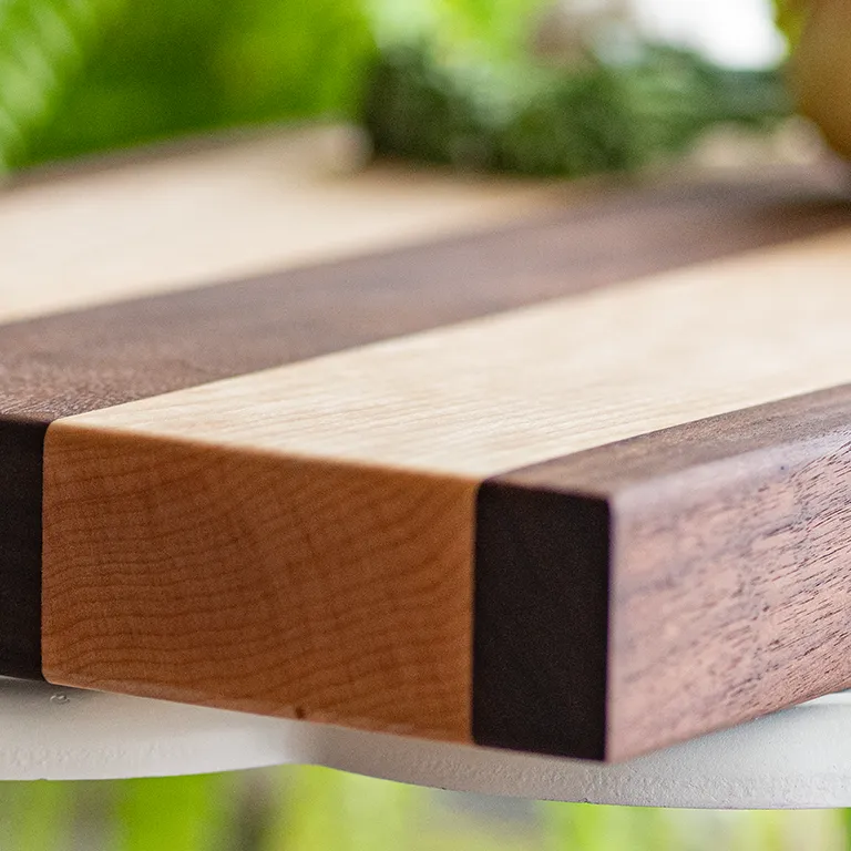 maple and walnut cutting board detail
